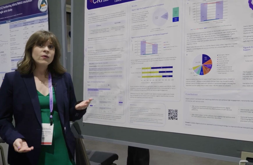 cynthia AACR at a presentation board